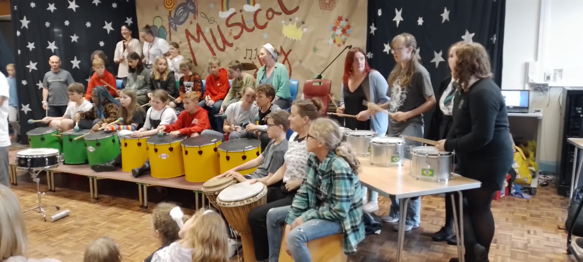 Junior samba band playing drums